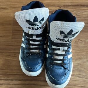 Blue adidas high tops